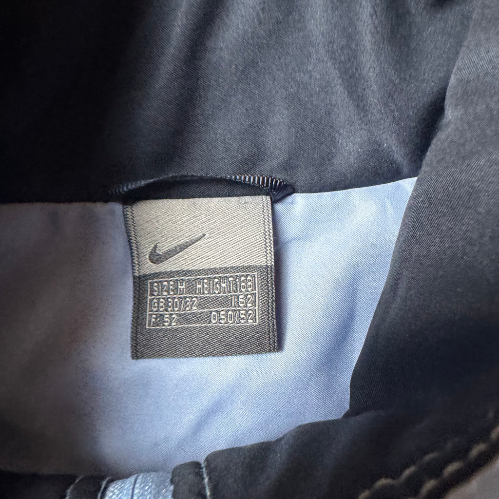 Light Blue Vintage Nike Windbreaker - M